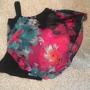 Sleeveless top with sheer overlay